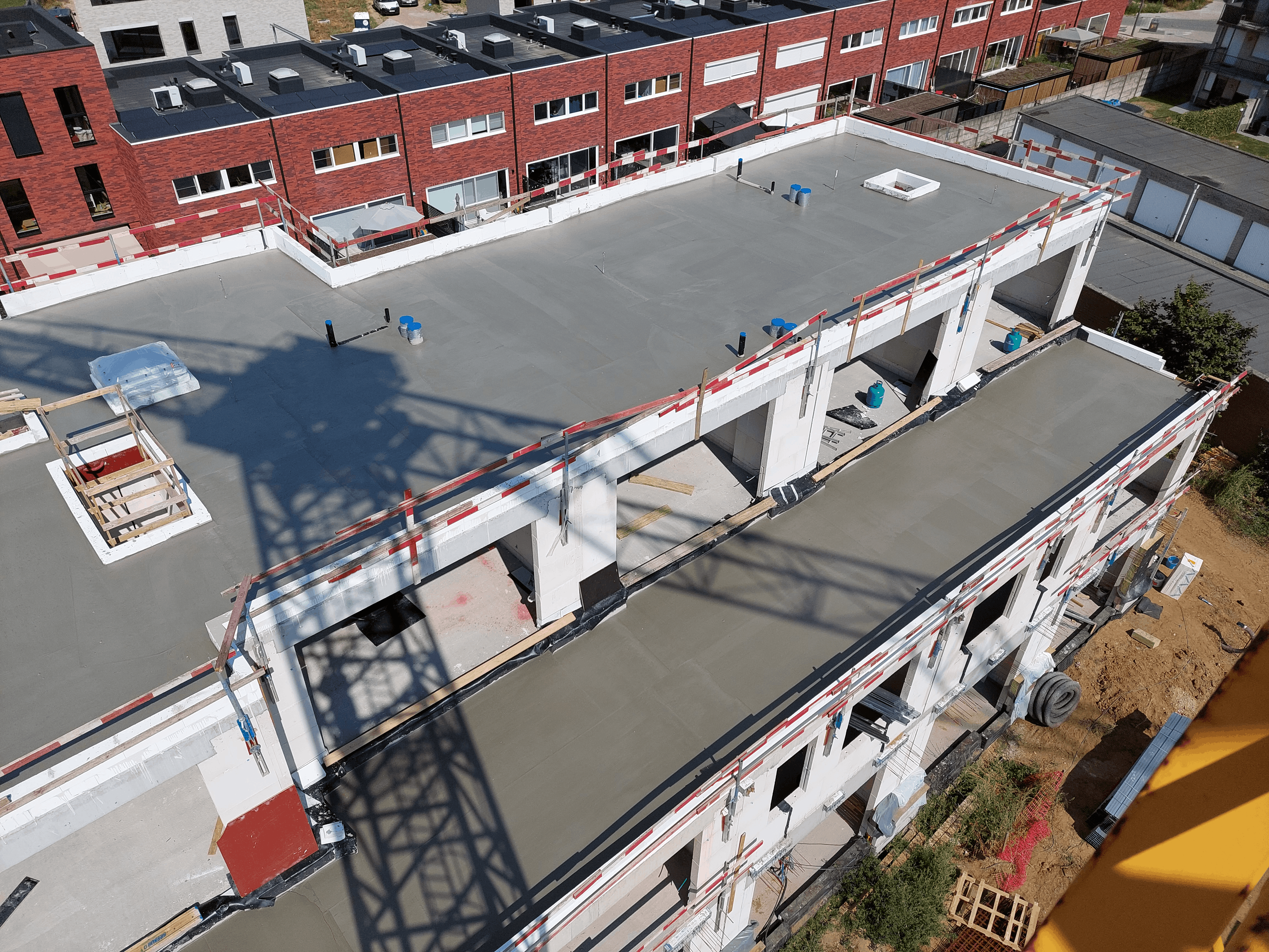 Toepassing van hellingsbeton op platte daken